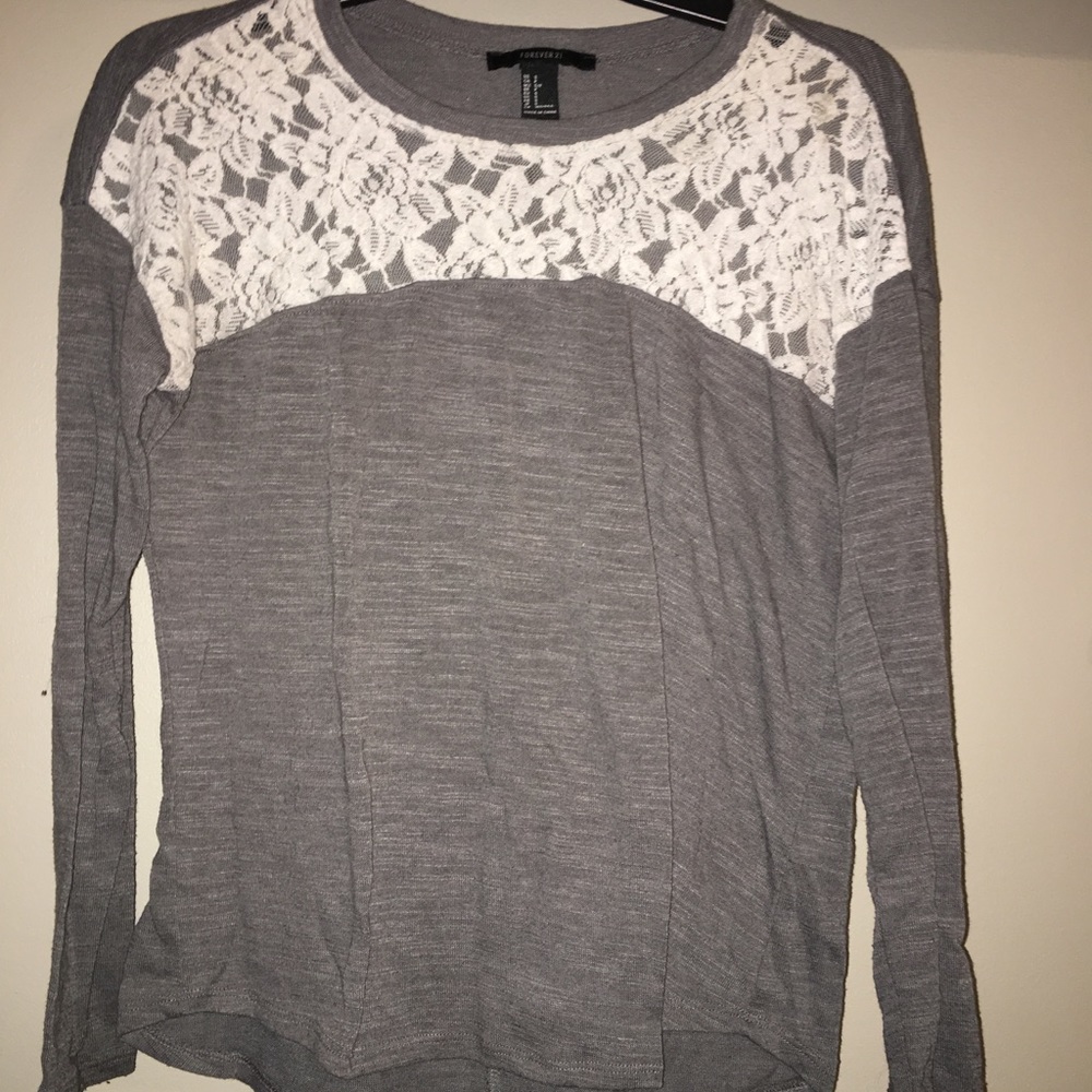 A gray lace long sleeve shirt